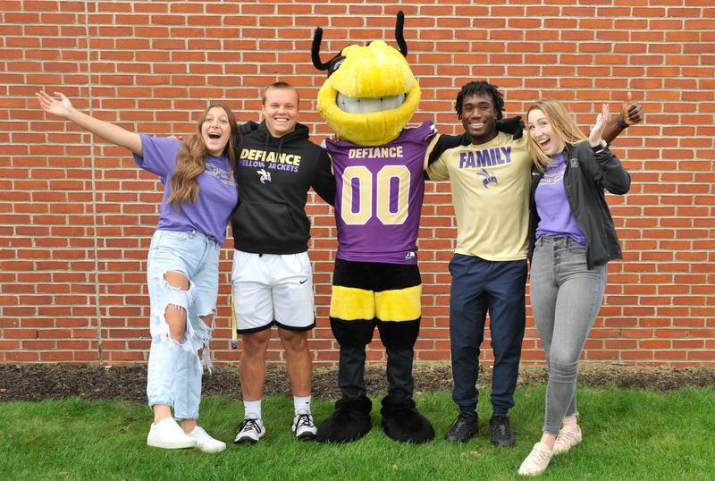Defiance College students and mascot